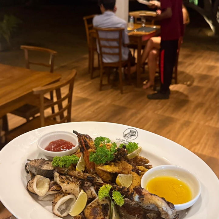 A grilled seafood platter with prawns, squid and fish at Leopard Inn Arugam Bay
