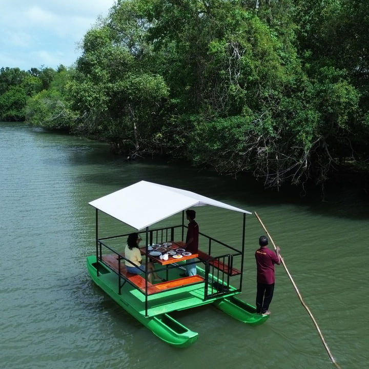 Breakfast laid on a poled pontoon on the river at Wilpattu